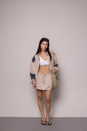 SET FALDA Y CHAQUETA ANTIFLUIDO-BEIGE